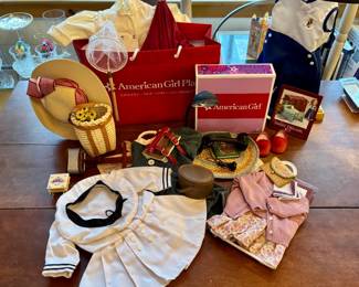 American Girl outfits. Many with accessories. Some MIB items too.