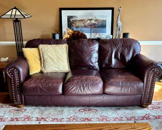 Sofa view. Wear on right arm. 