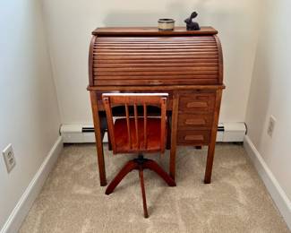Child's roll top desk and chair.