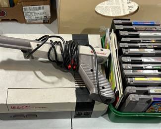 Nintendo Entertainment System (NES) with Zapper Light Gun and Games