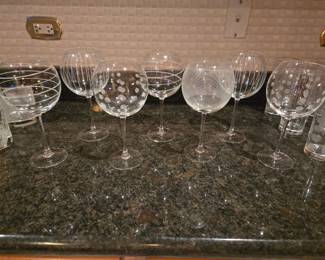 Mikasa Cheers Collection glasses set.  Includes 24 pieces. 7 bubble wine glasses, 7 highball, 5 whiskey glasses, 7 champagne flutes. $70