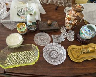 Variety of vintage glasswear and trinkets.  Saki set, candle cutter, colored glass, ink blotter, cut glass, ginger jars.  Just a sampling.