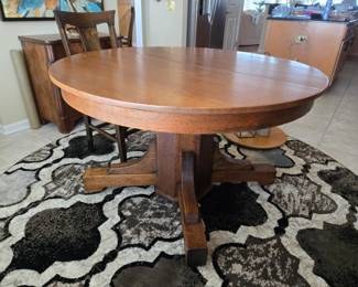 Vintage Stickley Style Oak Table with 4 chairs. 2 extensions. $3,000 or make an offer.