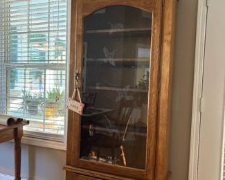 Gun cabinet with lighting, built in shelving, key