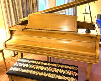 Honey oak tone baby grand piano with bench