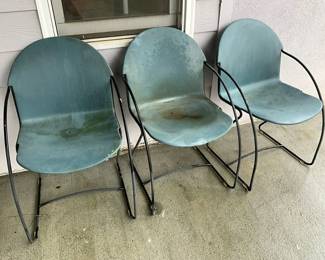 Three Plastic IndoorOutdoor Chairs