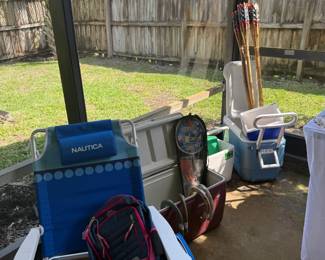 Coolers, beach chairs, tiki torches