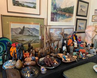 African - Carved, Ceramic, and Beaded Animal Statues including Giraffes, Hippopotamus, and Lions, Fabric Dolls, Woven Baskets and Bowls, Masks and Trinket Boxes, Wire Art