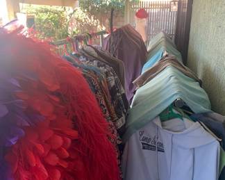 Six Rolling Racks of Clothes, Muumuus, and Boas