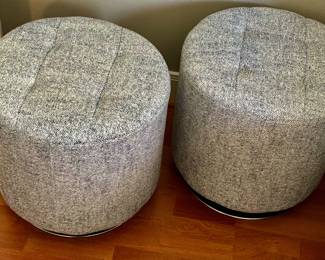 A Pair of Round Upholstered Ottomans