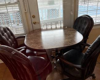 Swivel chairs with table