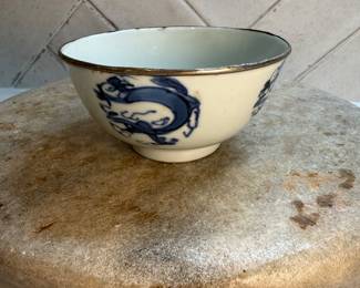 #133 "A Chinese Tea Bowl with a Silver Rim and an $100 Image of a Dragon in Blue Made for Export to Vietnam from the Qing Dynasty - 200 Years old " $100.00