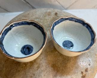 #110 "A Pair of Japanese Tea Cups from Arita with Blue Wave Designs and Images of Fans in Relief from the Late Edo Period - 200 Years Old" $125.00