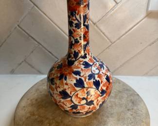 #91 "A Japanese Imari Porcelain Bottle and Lid with Images of Blue and Red Flowers from the Late Edo Period - 200 Years Old" $195.00