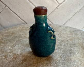 #85 "A Chinese Pottery Snuff Bottle in Turquoise Green Crackle Glaze with Dragon Heads in Relief from the Late Qing Dynasty - 125 Years Old" SOLD