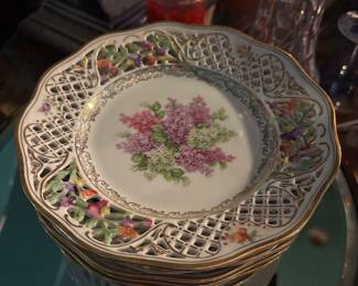 Pierced porcelain plates
