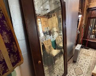 Beautiful arched door with a mirror 