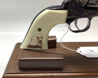 Strum Ruger Vaquero 45 cal. Classis western 6 shot features jeweled hammer, trigger and eagle grips. It is holstered with a custom leather belt and holster. All guns, pistols, rifles and shotguns are subject to FFL firearms regulations