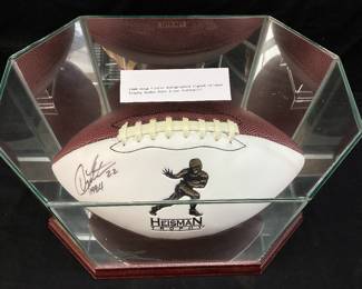 AUTOGRAPHED 1984 DOUG FLUTIE #22 BOSTON COLLEGE COMMEMORATIVE HEISMAN TROPHY, BADEN FOOTBALL IN DISPLAY CASE