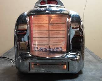 Camel Joe's diner radio (radio tuner not working) Lights work but tuner and tape functions NOT WORKING. Has blemish on curved plexi and general signs of wear.