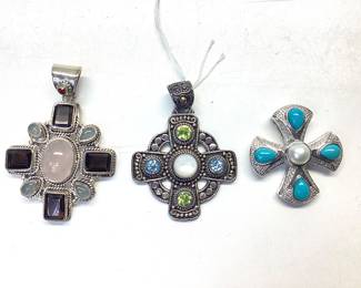 3 STERLING SILVER CROSS PENDANTS Designed by BA Suarti Bali cross, turquoise and pearl unknown and aquarium smoky and rose quartz and one garnet Maltese cross pendant 39.28 gram