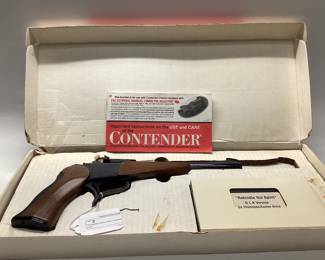  Thompson Center Arms Contender 44 Rem. Mag. This pistol is in mint condition. Looks to be never fired, in original box with paperwork and instructional VHS. All guns, pistols, rifles and shotguns are subject to FFL firearms regulations.