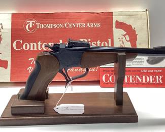  Thompson Center Arms Contender 44 Rem. Mag. This pistol is in mint condition. Looks to be never fired, in original box with paperwork and instructional VHS. All guns, pistols, rifles and shotguns are subject to FFL firearms regulations.