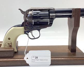 Strum Ruger Vaquero 45 cal. Classis western 6 shot features jeweled hammer, trigger and eagle grips. It is holstered with a custom leather belt and holster. All guns, pistols, rifles and shotguns are subject to FFL firearms regulations