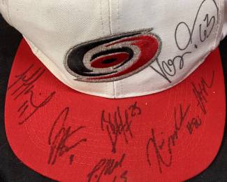 NHL EARLY 2000s CAROLINA HURRICANES AUTOGRAPHED HAT AND GLOVE, NO COA