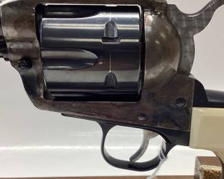 Strum Ruger Vaquero 45 cal. Classis western 6 shot features jeweled hammer, trigger and eagle grips. It is holstered with a custom leather belt and holster. All guns, pistols, rifles and shotguns are subject to FFL firearms regulations