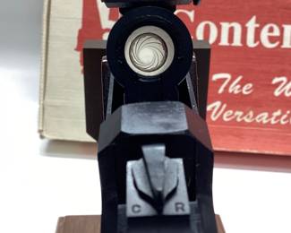  Thompson Center Arms Contender 44 Rem. Mag. This pistol is in mint condition. Looks to be never fired, in original box with paperwork and instructional VHS. All guns, pistols, rifles and shotguns are subject to FFL firearms regulations.