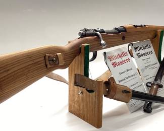 Mitchell's Mauser M48 8mm with bayonet Mitchell's Mauser 2002 is a collectors grade M48 version of the 98K built during the 1940's. It included collectors grade bayonet and cleaning kit. All guns, pistols, rifles and shotguns are subject to FFL firearms regulations