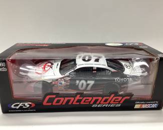 CHECKERED FLAG SPORTS DIE-CAST CAR FEATURING 2007 TOYOTA CAMRY NASCAR DESIGN FROM THE CONTENDER SERIES CAR IS AUTOGRAPHED ON THE HOOD