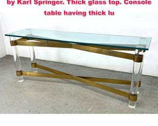 Lot 19 Lucite and Brass Console sofa Table by Karl Springer. Thick glass top. Console table having thick lu
