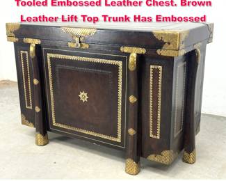 Lot 313 MAITLAND SMITH Empire style Tooled Embossed Leather Chest. Brown Leather Lift Top Trunk Has Embossed