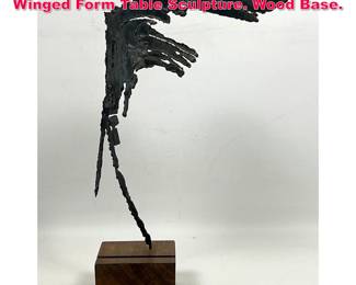 Lot 73 Vintage Brutalist Torch Cut Metal Winged Form Table Sculpture. Wood Base.