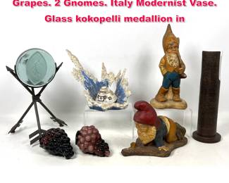 Lot 488 Assorted Mixed Shelf Lot. Glass Grapes. 2 Gnomes. Italy Modernist Vase. Glass kokopelli medallion in