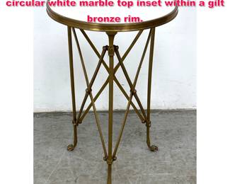 Lot 10 Directoire style side table featuring a circular white marble top inset within a gilt bronze rim.