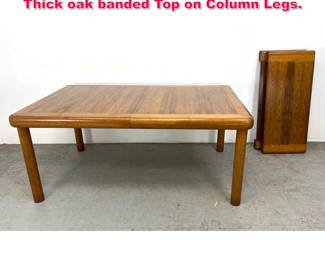 Lot 189 Dunbar Dining Table with 2 Leaves. Thick oak banded Top on Column Legs. 