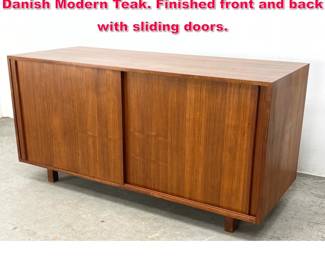 Lot 438 Double sided room divider credenza. Danish Modern Teak. Finished front and back with sliding doors. 