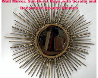Lot 254 UTTERMOST Gilt Metal Starburst Wall Mirror. Sun Burst Rays with Scrolls and Decorative Beaded Elemen