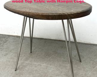 Lot 97 Contemporary Modern Thick Oval wood Top Table with Hairpin Legs. 