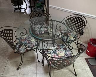 Wrought Iron and Glass Top Bistro Set with Floral Cushions