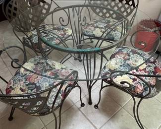 Wrought Iron and Glass Top Bistro Set with Floral Cushions