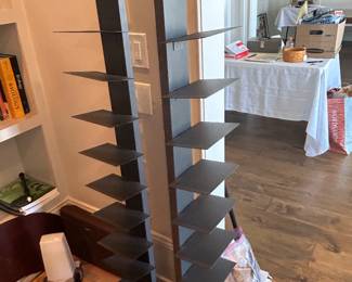 Floating book shelf towers