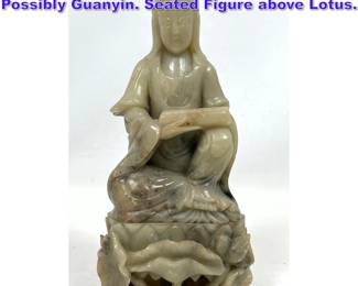Lot 1014 Carved Stone Asian Figure, Possibly Guanyin. Seated Figure above Lotus. 