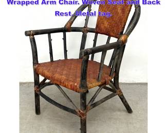 Lot 1156 PALECEK Wood Frame Rattan Wrapped Arm Chair. Woven Seat and Back Rest. Metal tag. 