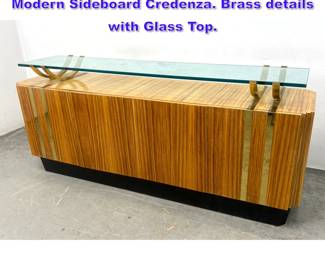 Lot 679 Leon Rosen Designer Mid Century Modern Sideboard Credenza. Brass details with Glass Top. 
