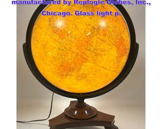 Lot 1148 Terrestrial library globe manufactured by Replogle Globes, Inc., Chicago. Glass light p. 