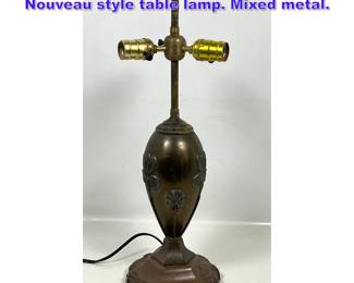 Lot 972 Edward Miller and Company Art Nouveau style table lamp. Mixed metal. 